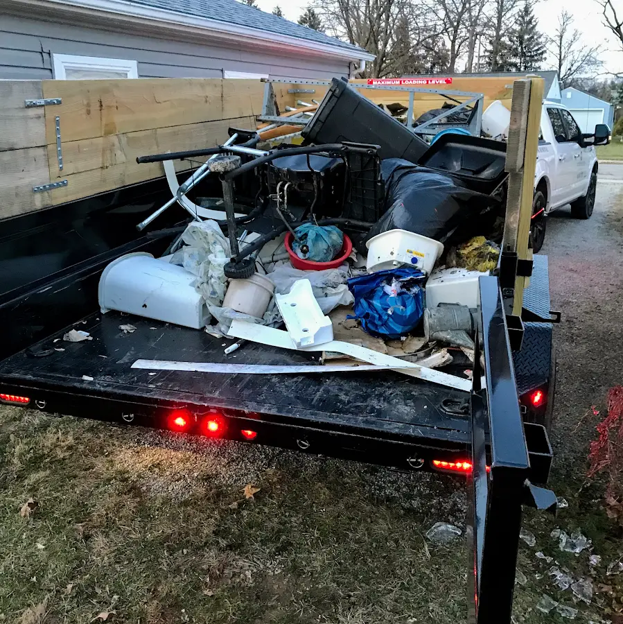Roll-off dumpster delivered to a residential driveway in Muttontown